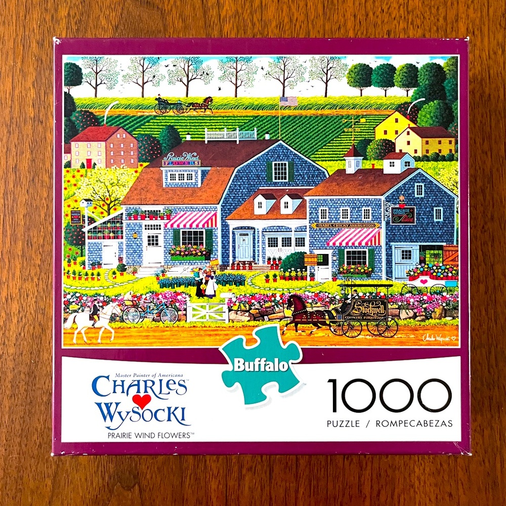 Charles Wysocki 1000 Piece Puzzle “Prarie Wind and Flowers”